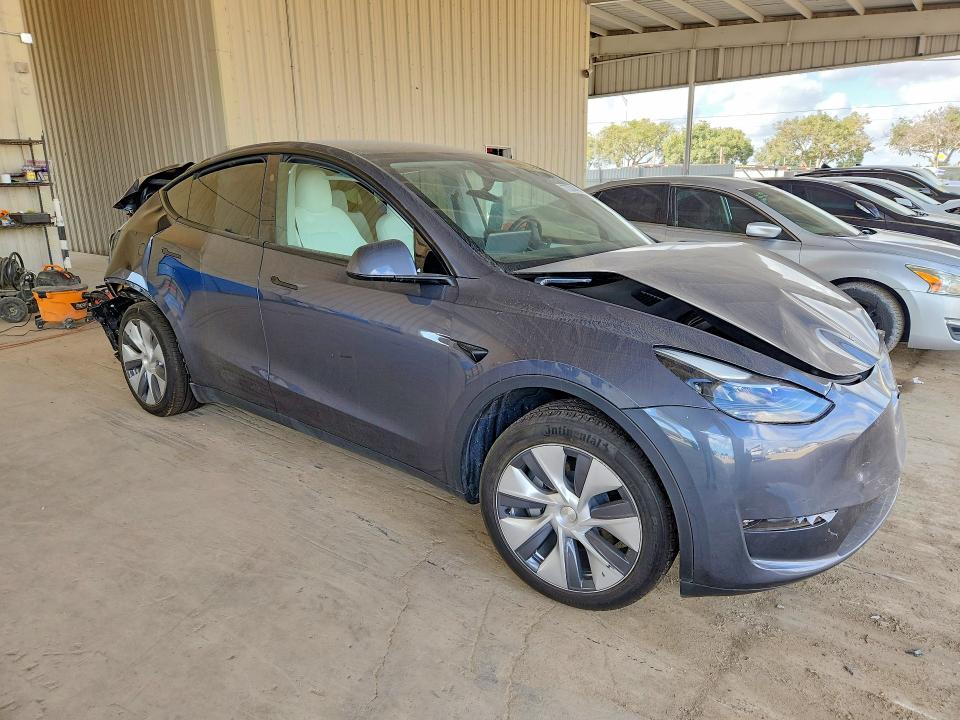 2023 Tesla Model y VIN 7SAYGDED8PF942104 COPART salvage auction — REAR END, Salvage Title, sold $2,800 on 2026-07-22 (photo 4)