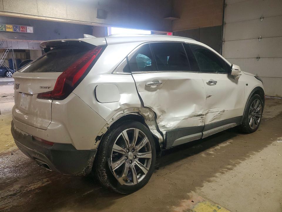 2022 Cadillac Xt4 VIN 1GYFZCR44NF134130 COPART salvage auction — SIDE, In - Cert Of Title-Salvage Title, sold $200 on 2026-07-02 (photo 3)