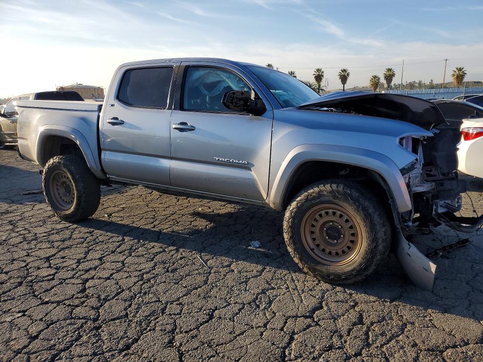 2021 Toyota Tacoma VIN 5TFAZ5CN3MX116966 COPART salvage auction — ROLLOVER, Salvage Title, sold $4,650 on 2026-07-23 (photo 4)