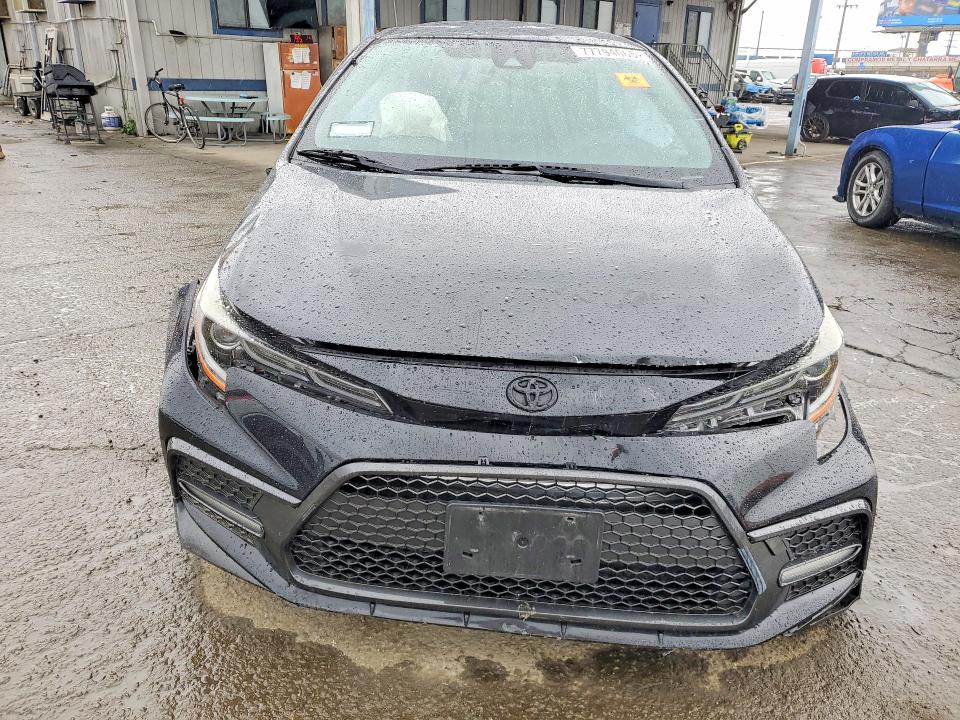2021 Toyota Corolla VIN JTDS4MCE7MJ075256 COPART salvage auction — ALL OVER, Ca - Salvage Certificate, sold $1,250 on 2026-07-16 (photo 5)