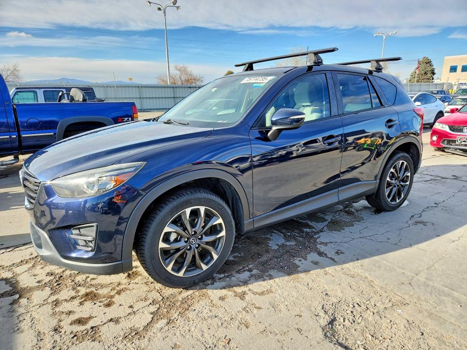 2016 Mazda Cx-5 VIN JM3KE4DY3G0785391 COPART salvage auction — HAIL, Co - Certificate Of Title, sold $7,200 on 2026-07-29 (photo 1)