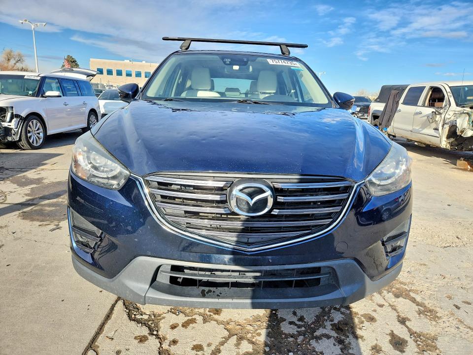 2016 Mazda Cx-5 VIN JM3KE4DY3G0785391 COPART salvage auction — HAIL, Co - Certificate Of Title, sold $7,200 on 2026-07-29 (photo 5)