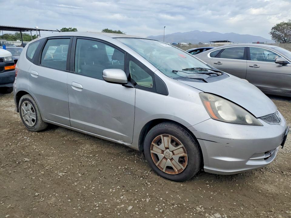 2012 Honda Fit VIN JHMGE8H39CS000793 COPART salvage auction — SIDE, Salvage Title, sold $1,050 on 2026-07-25 (photo 4)