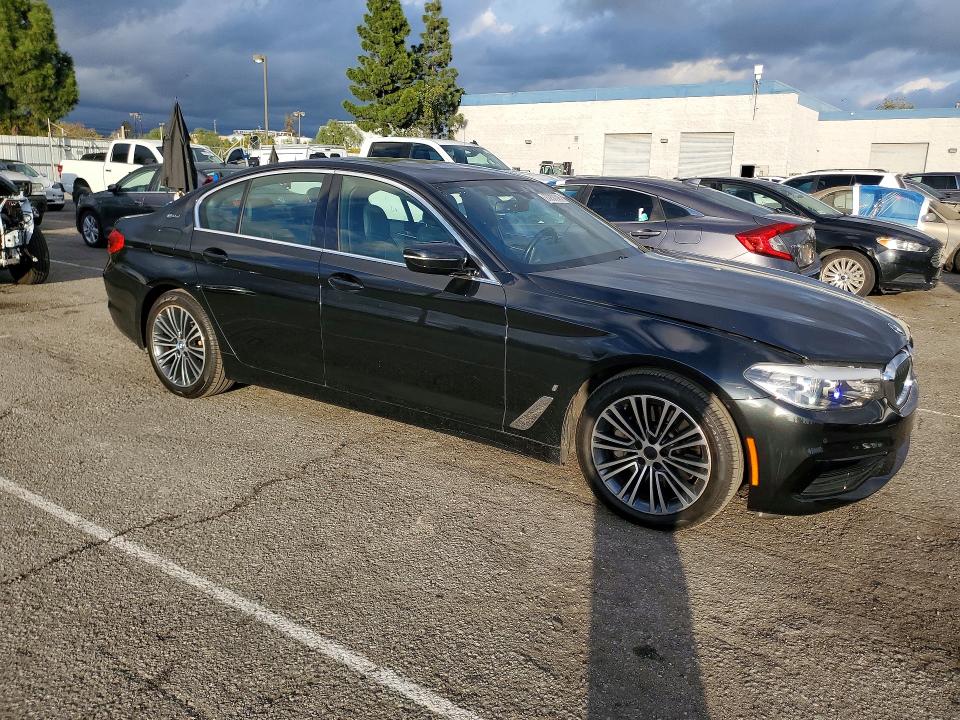 2019 BMW 5 series VIN WBAJA9C56KB389776 COPART salvage auction — MINOR DENT/SCRATCHES, Ca - Dis/Dlr/Exp Clean W/Salv Hist, sold $7,700 on 2026-07-28 (photo 4)