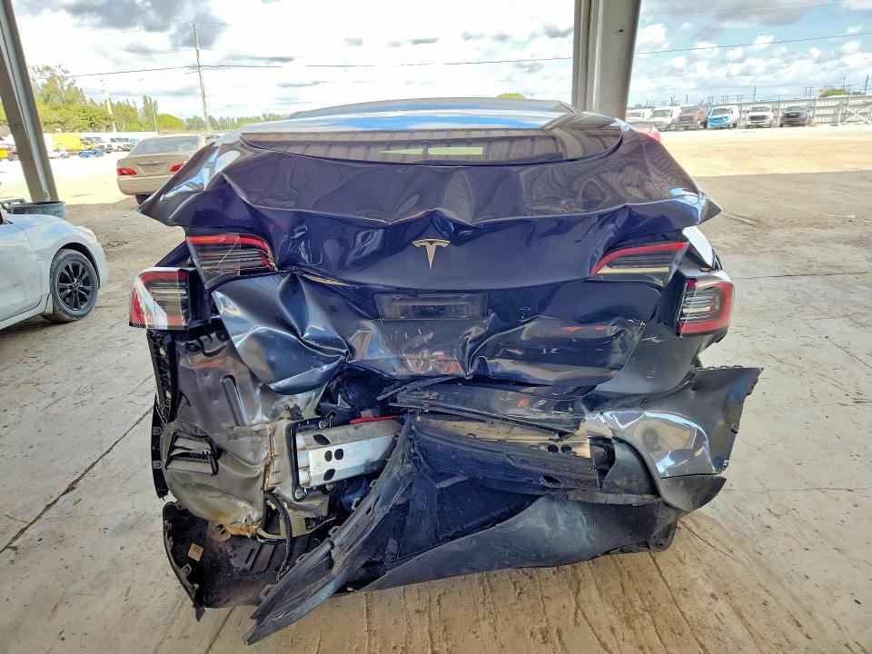 2023 Tesla Model y VIN 7SAYGDED8PF942104 COPART salvage auction — REAR END, Salvage Title, sold $2,800 on 2026-07-22 (photo 6)