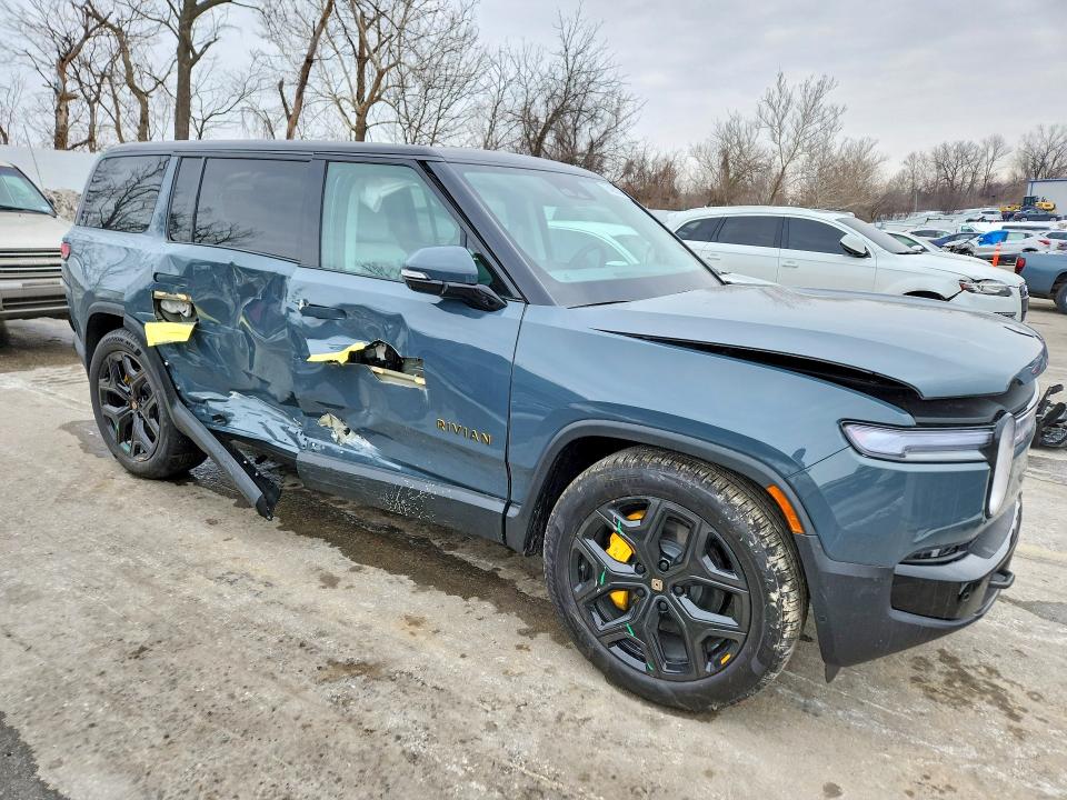 2026 Rivian R1s VIN 7PDSGBBP1TN081911 COPART salvage auction — SIDE, Mo - Salvage Certificate Of Title, sold $38,500 on 2026-07-28 (photo 4)