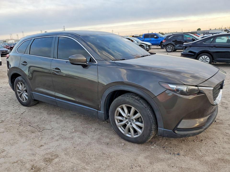 2016 Mazda Cx-9 VIN JM3TCABY6G0111232 COPART salvage auction — NORMAL WEAR, MI - CERTIFICATE OF TITLE, sold $1,200 on 2026-07-31 (photo 4)