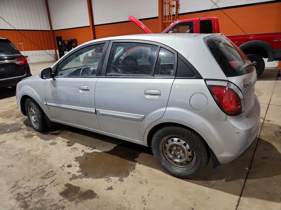 2011 Kia Rio VIN KNADH5B39B6756700 COPART salvage auction — VANDALISM, AB - BOS - SALVAGE, sold $450 on 2026-07-14 (photo 2)