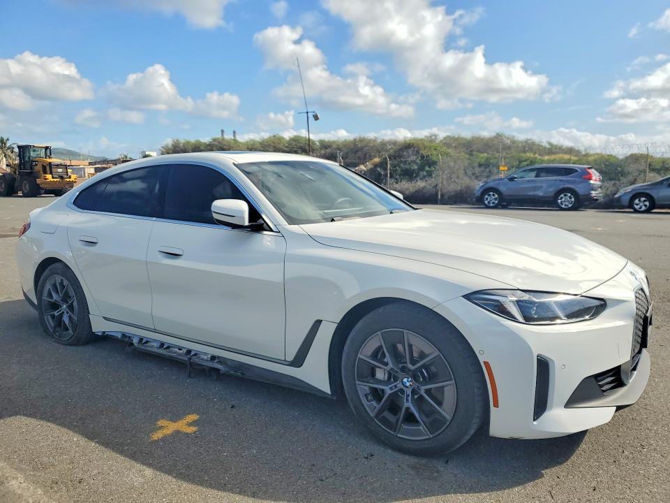 2025 BMW I4 VIN WBY23HD09SFU44999 COPART salvage auction — SIDE, Hi - Certificate Of Title, sold $20,100 on 2026-07-27 (photo 4)