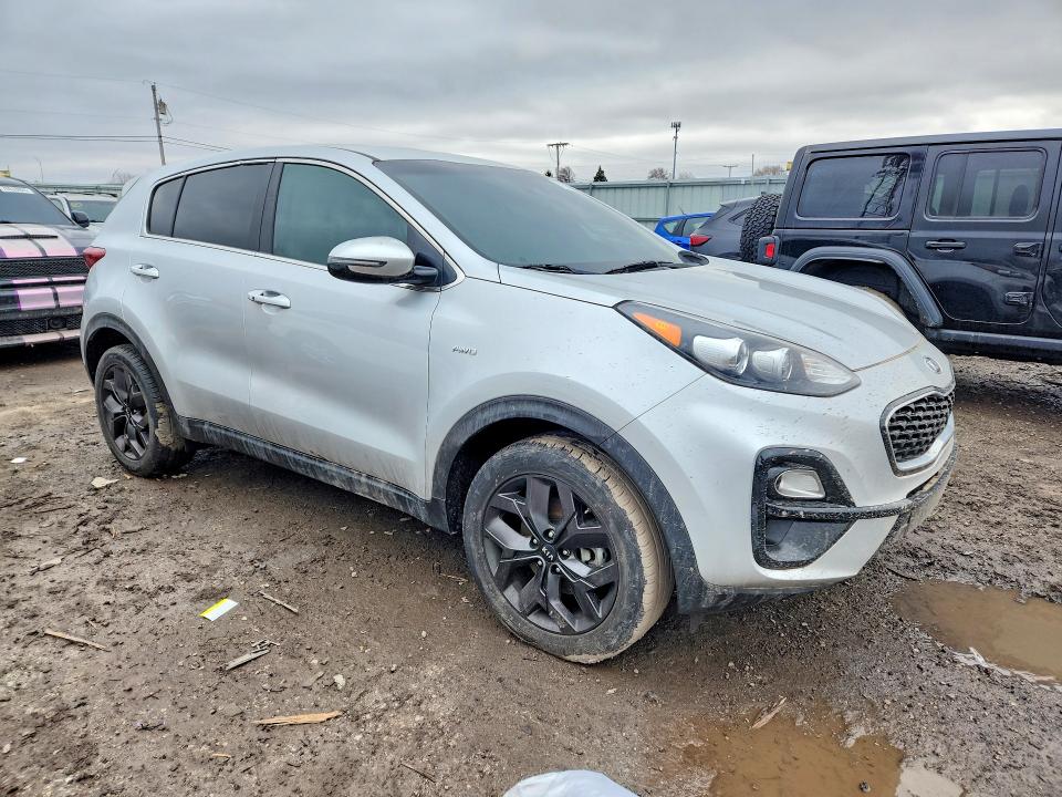 2022 Kia Sportage VIN KNDPMCAC0N7965047 COPART salvage auction — INTERIOR BURN, IN - CERT OF TITLE-SALVAGE TITLE, sold $3,900 on 2026-07-13 (photo 4)
