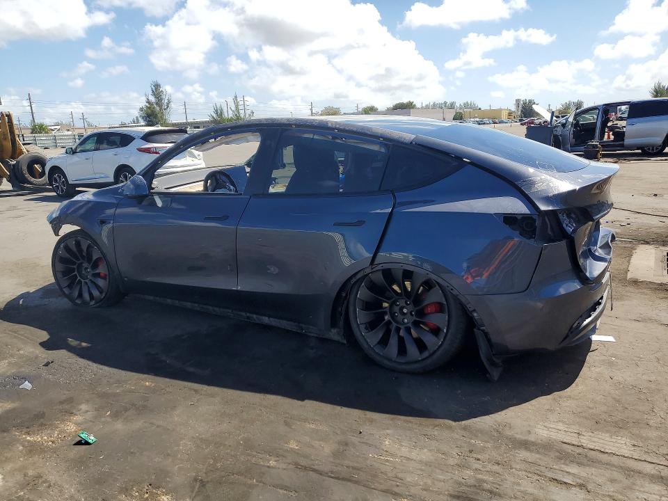 2022 Tesla Model y VIN 7SAYGDEF7NF309916 COPART salvage auction — ALL OVER, Mo - Salvage Certificate Of Title, sold $2,100 on 2026-07-22 (photo 2)