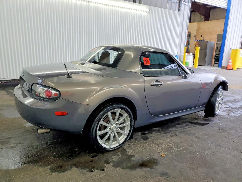 2007 Mazda Mx-5 miata VIN JM1NC26F570124912 COPART salvage auction — STRIPPED, Fl - Certificate Of Title, sold $150 on 2026-07-07 (photo 3)