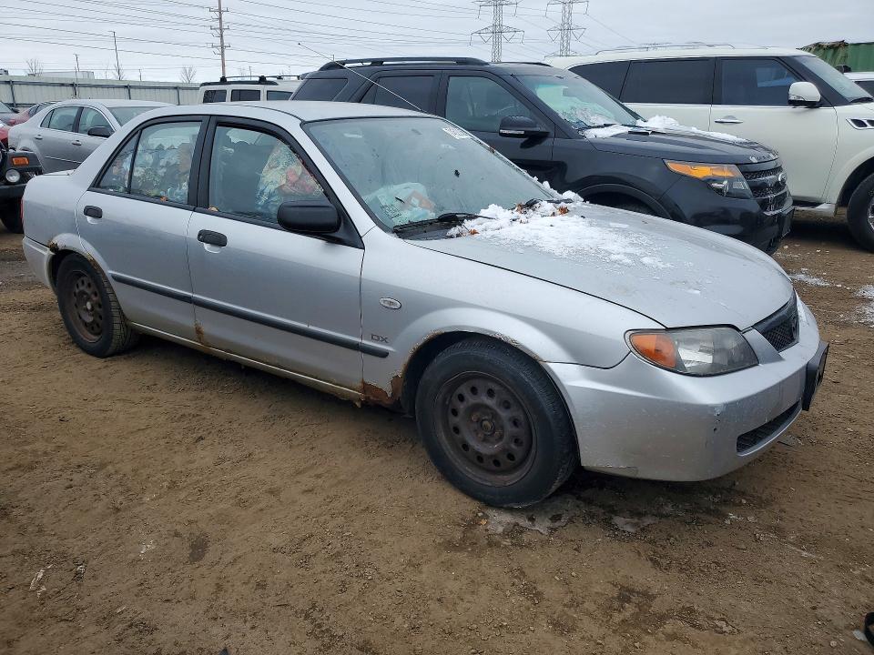 2003 Mazda Protege VIN JM1BJ225730104693 COPART salvage auction — MINOR DENT/SCRATCHES, Il - Cert Of Title-Corrected, sold $275 on 2026-07-02 (photo 4)