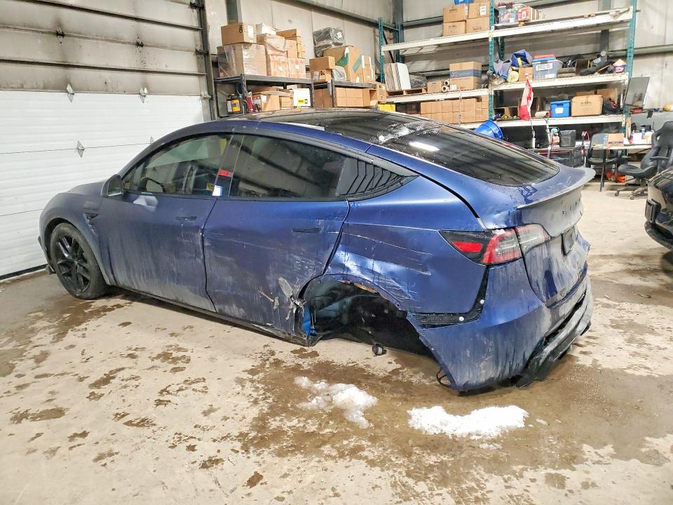 2023 Tesla Model y VIN 7SAYGDEE7PF648573 COPART salvage auction — REAR END, On - Permit No Brand - Unfit, sold $16,650 on 2026-07-02 (photo 2)
