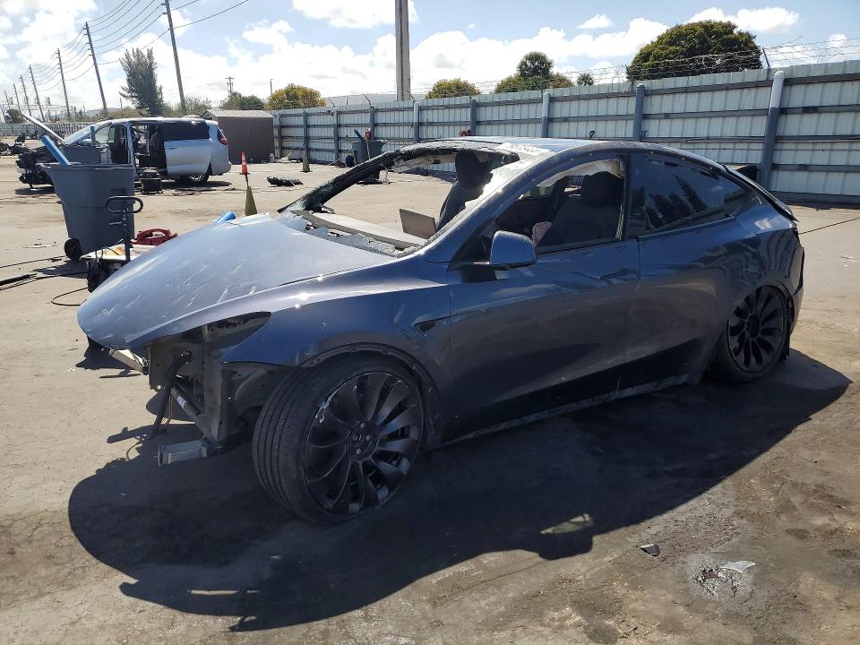 2022 Tesla Model y VIN 7SAYGDEF7NF309916 COPART salvage auction — ALL OVER, Mo - Salvage Certificate Of Title, sold $2,100 on 2026-07-22 (photo 1)