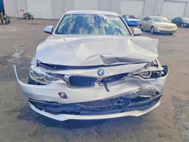 2018 BMW 3 series VIN WBA8E1G57JNU92507 COPART salvage auction — FRONT END, FL - CERT OF TITLE SLVG REBUILDABLE, sold $1,850 on 2026-07-27 (photo 5)