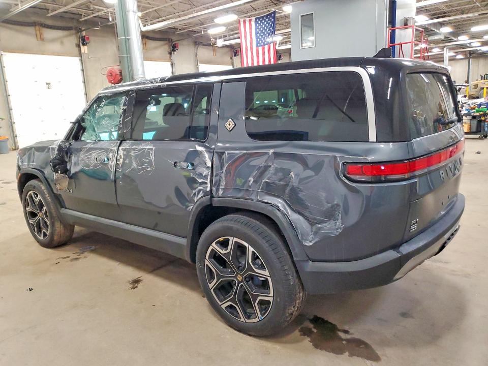 2025 Rivian R1S VIN 7PDSGBBA3SN069267 COPART salvage auction — Rollover, ID - SALVAGE CERTIFICATE OF TITLE, sold $34,750 on 2026-08-06 (photo 2)