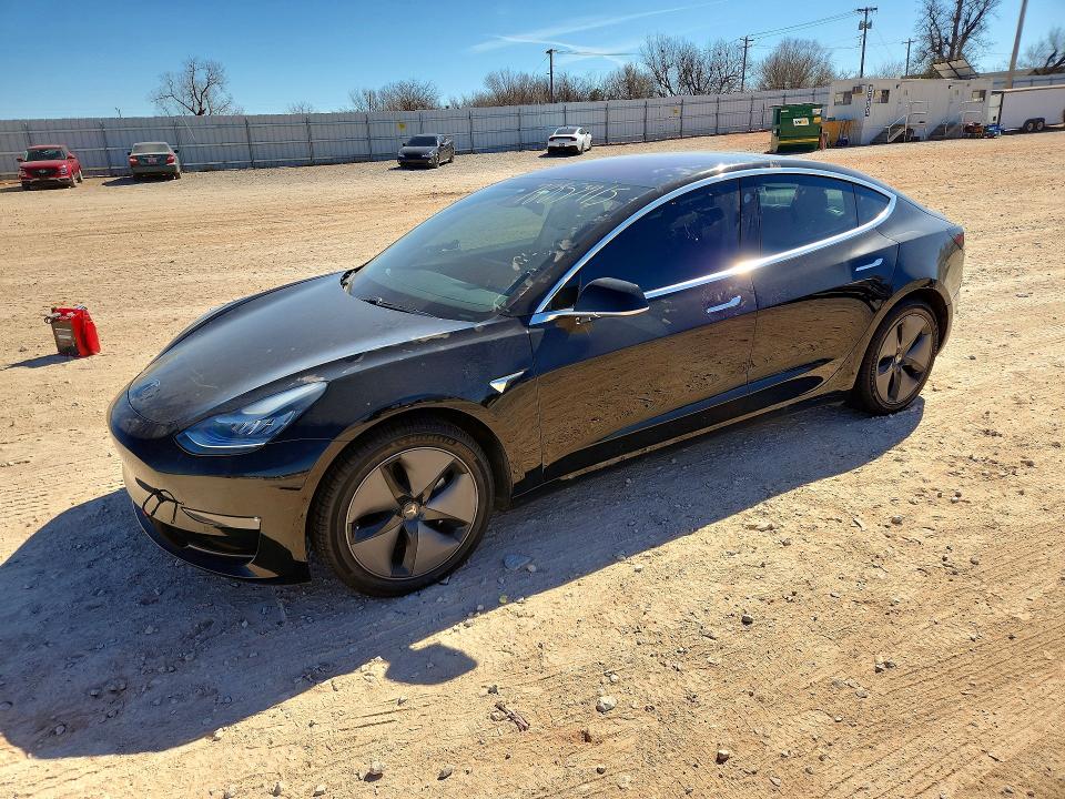 2019 Tesla Model 3 VIN 5YJ3E1EA7KF306090 COPART salvage auction — REAR END, Ok - Cert Of Title-Salvage, sold $550 on 2026-07-09 (photo 1)