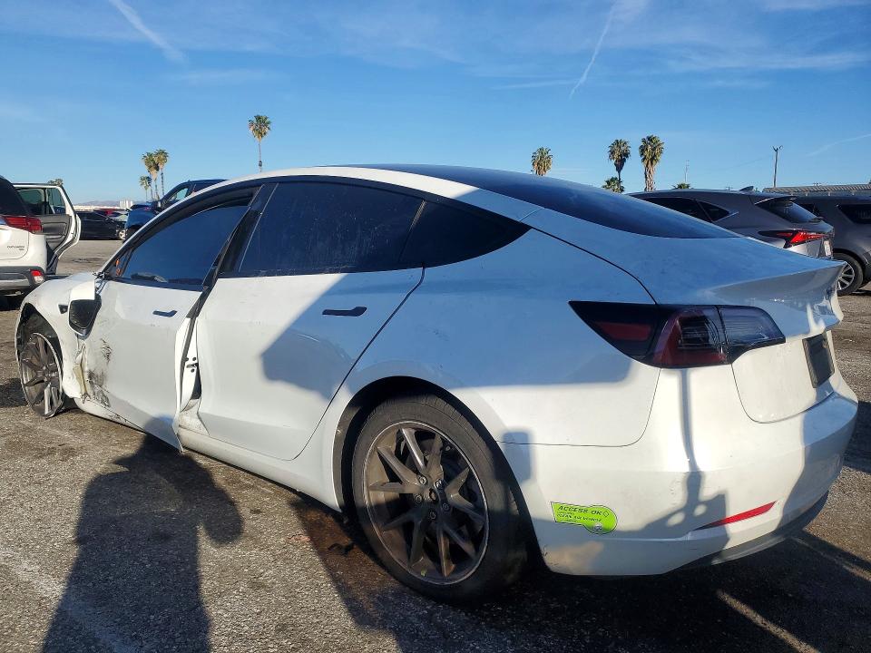 2023 Tesla Model 3 VIN 5YJ3E1EA0PF400870 COPART salvage auction — SIDE, CA - SALVAGE CERTIFICATE, sold $5,800 on 2026-07-31 (photo 2)