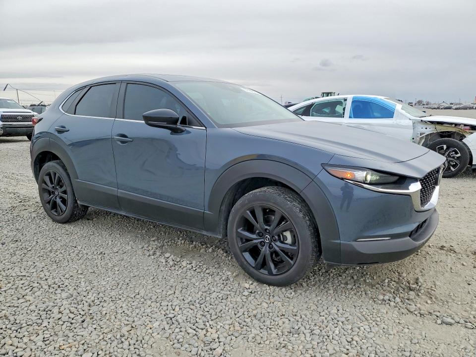 2023 Mazda Cx-30 VIN 3MVDMBCM2PM560883 COPART salvage auction — HAIL, Wy - Dis/Dlr/Exp Only Salvage Title, sold $12,800 on 2026-07-09 (photo 4)