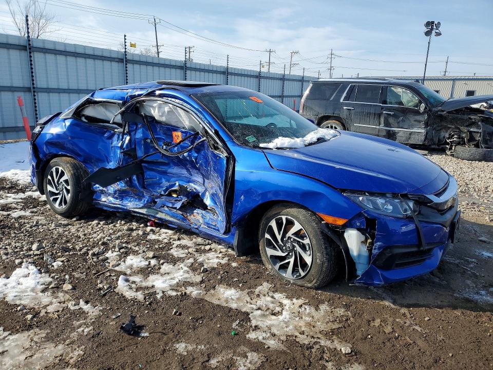 2017 Honda Civic VIN 2HGFC4B06HH311592 COPART salvage auction — SIDE, Il - Salvage Certificate, sold $575 on 2026-07-09 (photo 4)