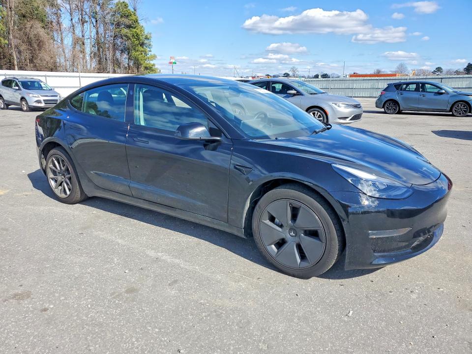 2022 Tesla Model 3 VIN 5YJ3E1EA9NF101245 COPART salvage auction — SIDE, Nc - Salvage Certificate Of Title, sold $375 on 2026-07-09 (photo 4)