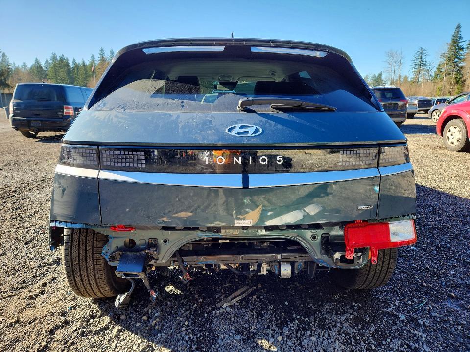 2025 Hyundai Ioniq VIN 7YAKMDDCXSY019614 COPART salvage auction — REAR END, Salvage Title, sold $12,400 on 2026-07-14 (photo 6)