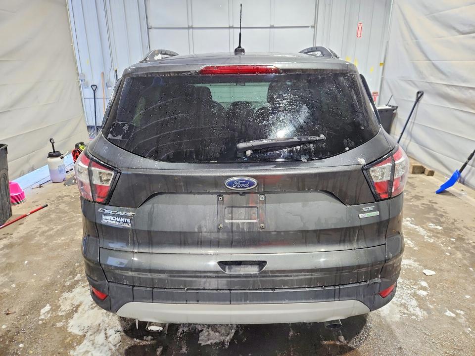 2018 Ford Escape VIN 1FMCU0GD3JUB19239 COPART salvage auction — MINOR DENT/SCRATCHES, NH - CERTIFICATE OF TITLE, sold $100 on 2026-07-09 (photo 6)