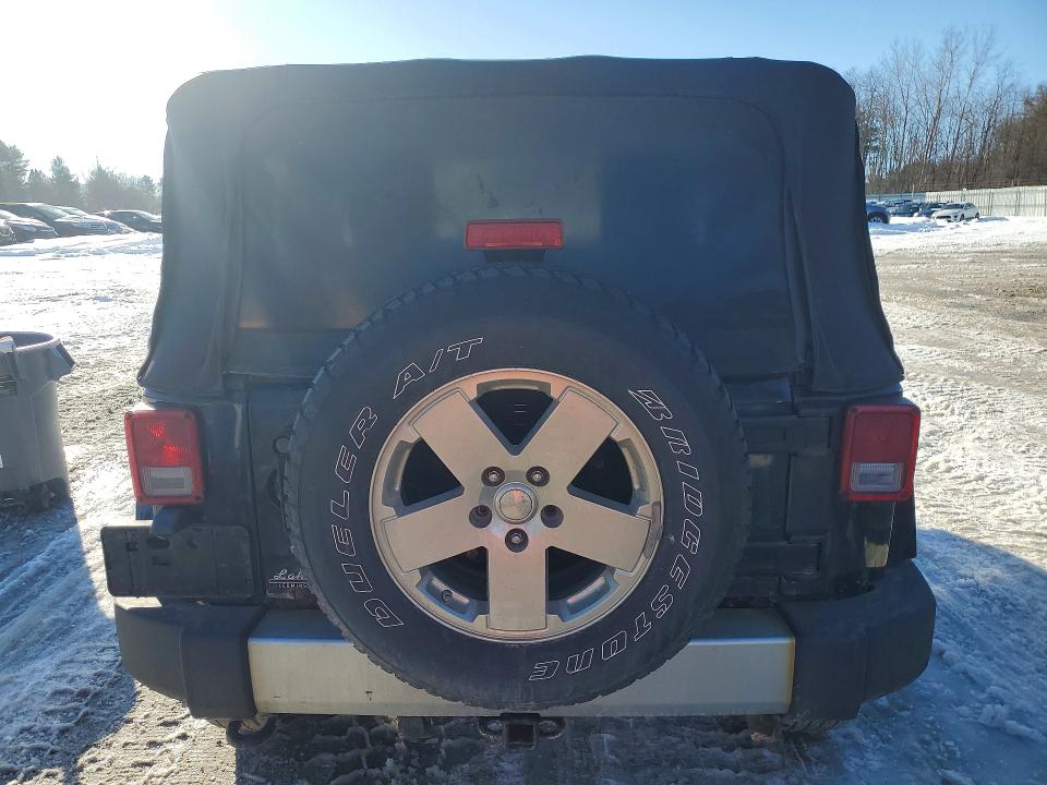 2010 Jeep Wrangler / VIN 1J4AA5D19AL137210 COPART salvage auction — NORMAL WEAR, Mt - Certificate Of Title, sold $1,450 on 2026-08-10 (photo 6)