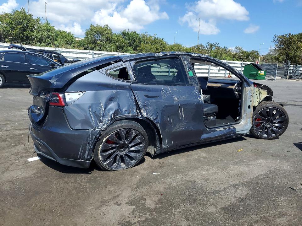 2022 Tesla Model y VIN 7SAYGDEF7NF309916 COPART salvage auction — ALL OVER, Mo - Salvage Certificate Of Title, sold $2,100 on 2026-07-22 (photo 3)