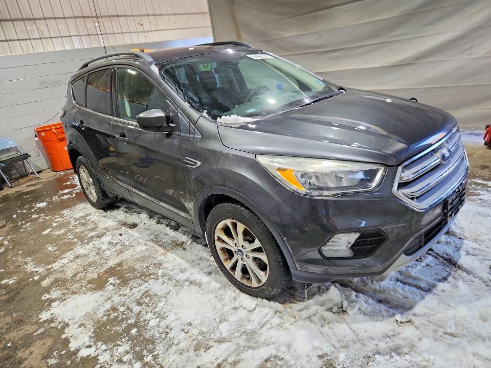 2018 Ford Escape VIN 1FMCU0GD3JUB19239 COPART salvage auction — MINOR DENT/SCRATCHES, NH - CERTIFICATE OF TITLE, sold $100 on 2026-07-09 (photo 4)
