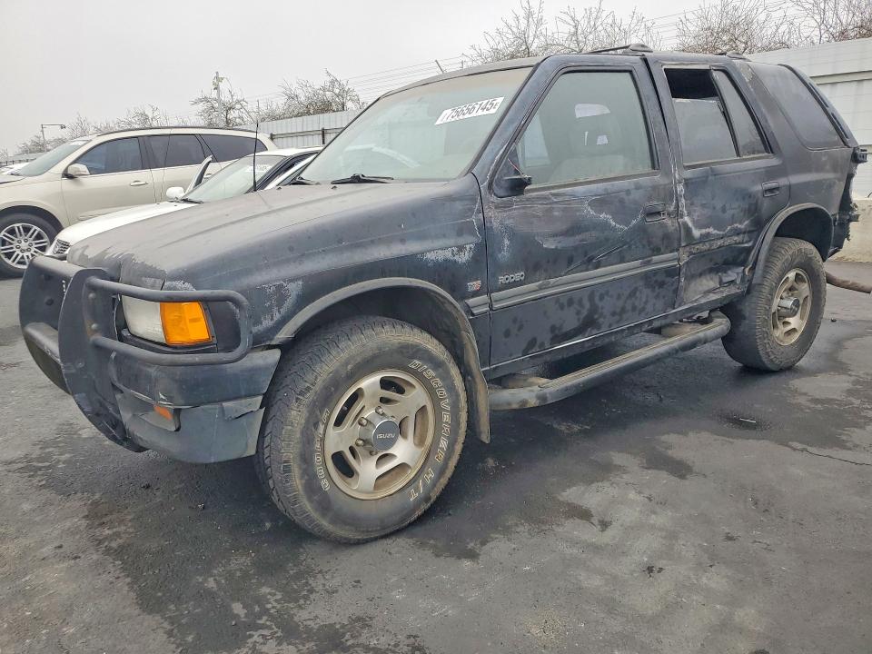 1997 Isuzu Rodeo VIN 4S2CM58V0V4302679 — COPART salvage auction photo