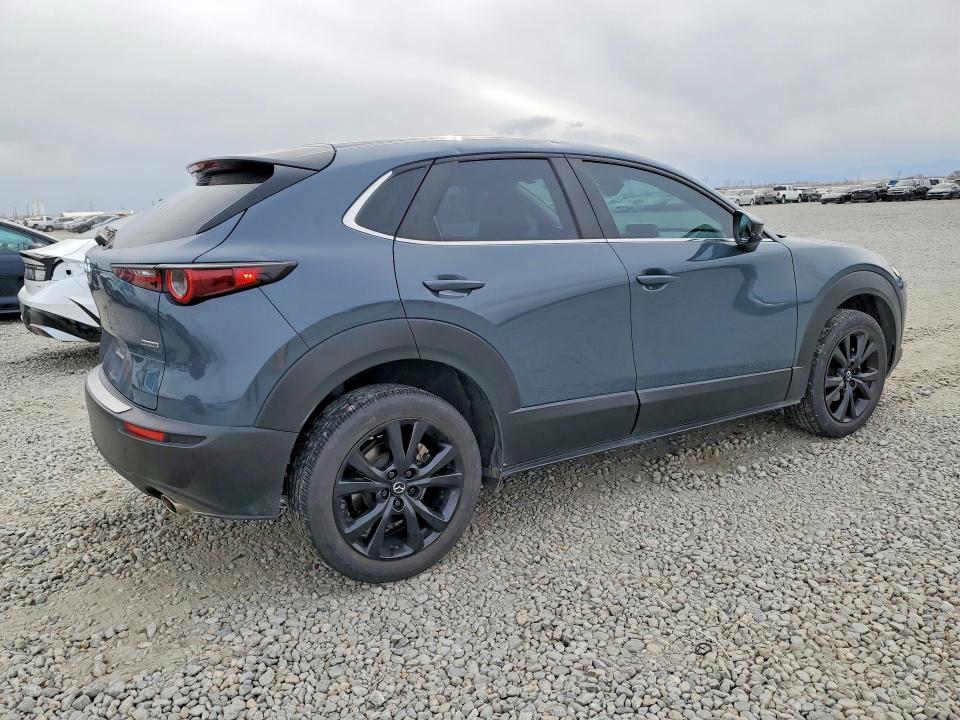 2023 Mazda Cx-30 VIN 3MVDMBCM2PM560883 COPART salvage auction — HAIL, Wy - Dis/Dlr/Exp Only Salvage Title, sold $12,800 on 2026-07-09 (photo 3)