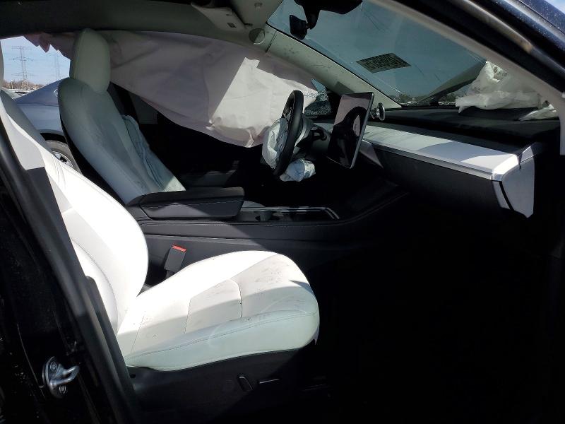 2023 Tesla Model y VIN 7SAYGDEF6PF662358 COPART salvage auction — ALL OVER, Il - Salvage Certificate, sold $4,450 on 2026-07-21 (photo 7)
