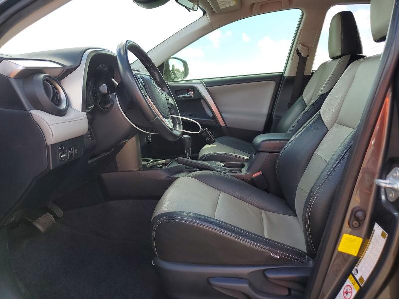 2018 Toyota Rav 4 VIN JTMWFREV8JJ750873 COPART salvage auction — SIDE, Salvage Title, sold $5,100 on 2026-07-15 (photo 7)