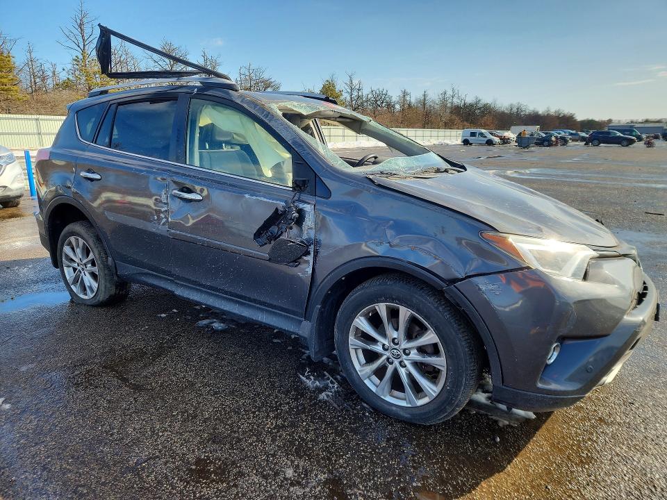 2016 Toyota Rav 4 VIN JTMDFREV6GD194268 COPART salvage auction — ROLLOVER, Id - Salvage Certificate Of Title, sold $2,650 on 2026-07-13 (photo 4)