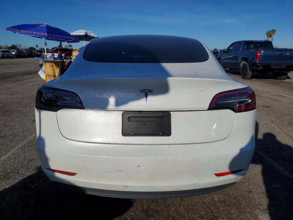 2023 Tesla Model 3 VIN 5YJ3E1EA0PF400870 COPART salvage auction — SIDE, CA - SALVAGE CERTIFICATE, sold $5,800 on 2026-07-31 (photo 6)