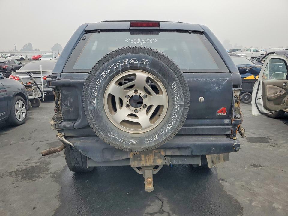 1997 Isuzu Rodeo VIN 4S2CM58V0V4302679 COPART salvage auction — REAR END, Ca - Salvage Certificate, sold $375 on 2026-07-02 (photo 6)