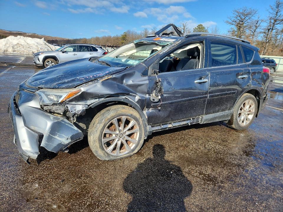 2016 Toyota Rav 4 VIN JTMDFREV6GD194268 COPART salvage auction — ROLLOVER, Id - Salvage Certificate Of Title, sold $2,650 on 2026-07-13 (photo 1)