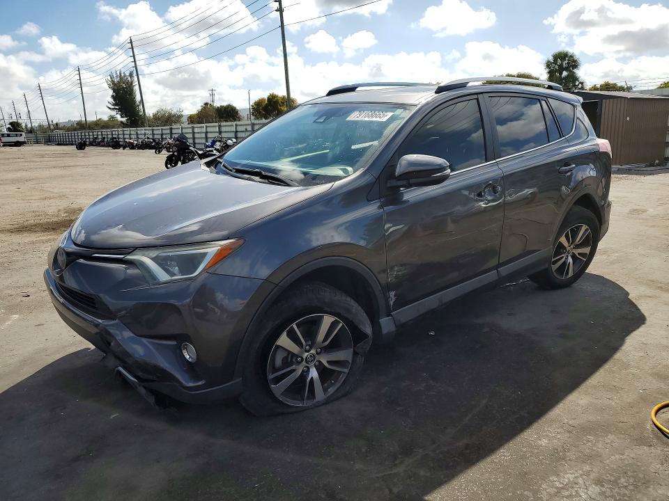 2018 Toyota Rav 4 VIN JTMWFREV8JJ750873 COPART salvage auction — SIDE, Salvage Title, sold $5,100 on 2026-07-15 (photo 1)