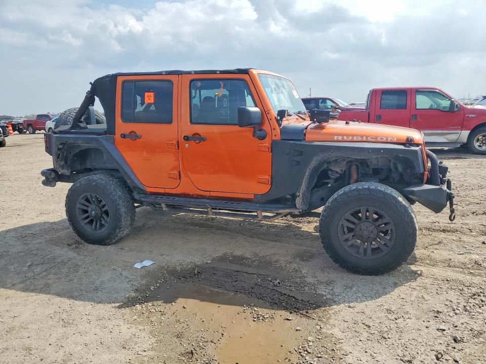 2011 Jeep Wrangler unlimited VIN 1J4BA6H18BL514339 COPART salvage auction — FRONT END, TX - SALVAGE VEHICLE TITLE, sold $2,200 on 2026-07-02 (photo 4)