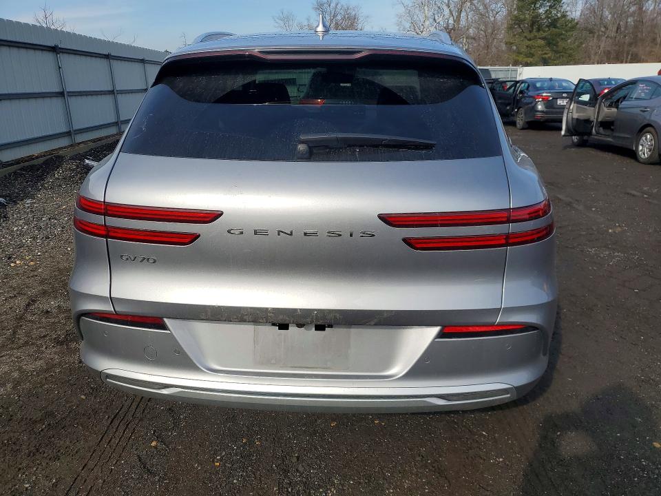 2023 Genesis Gv70 VIN 5NMMCET12PH000862 COPART salvage auction — SIDE, Md - Cert Of Salvage > 75% Damage, sold $14,100 on 2026-07-17 (photo 6)