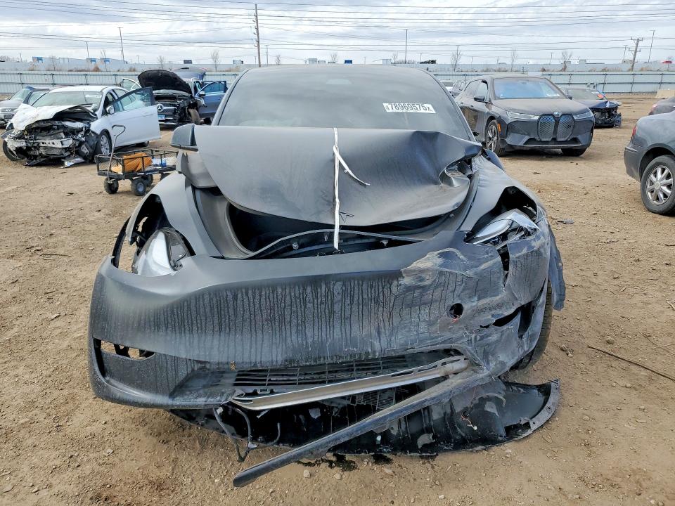 2023 Tesla Model y VIN 7SAYGDEF6PF662358 COPART salvage auction — ALL OVER, Il - Salvage Certificate, sold $4,450 on 2026-07-21 (photo 5)