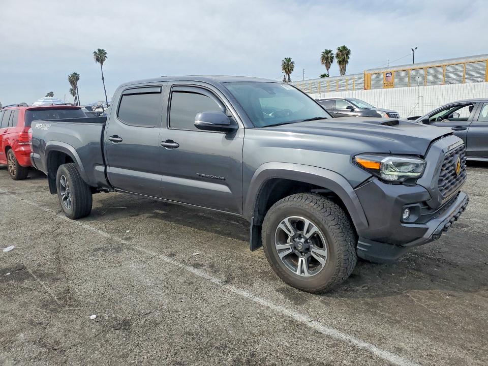 2023 Toyota Tacoma VIN 3TMDZ5BNXPM153862 COPART salvage auction — REAR END, Ca - Salvage Certificate, sold $16,000 on 2026-07-31 (photo 4)