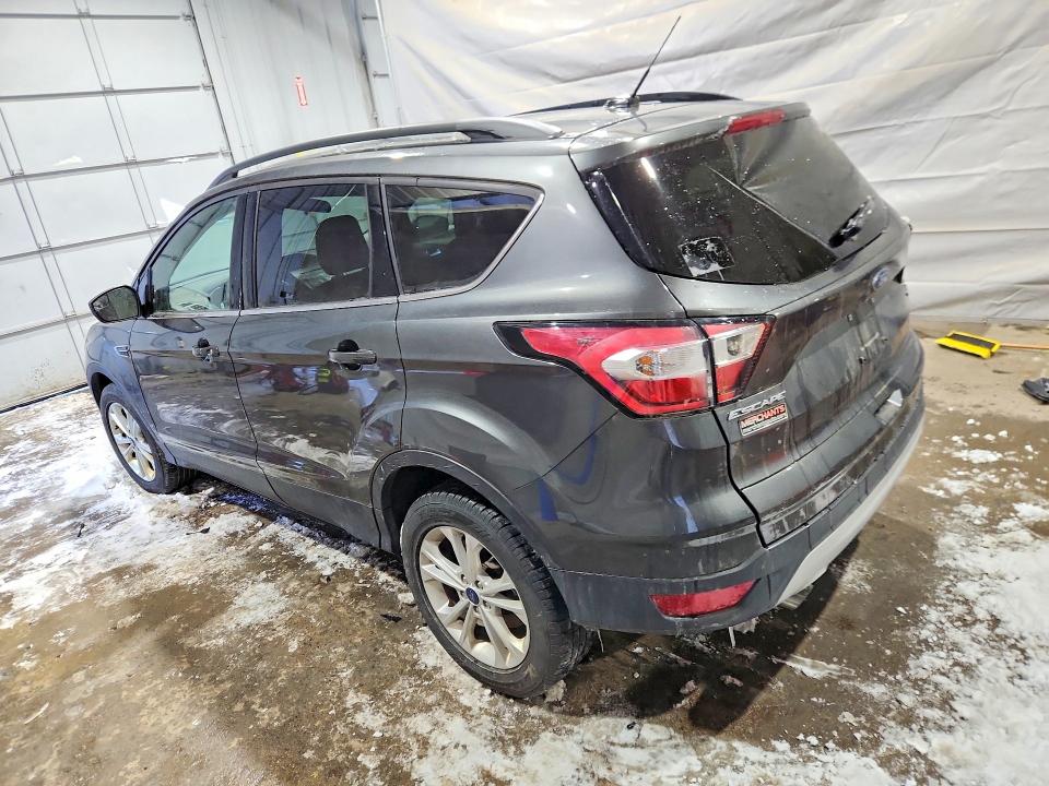 2018 Ford Escape VIN 1FMCU0GD3JUB19239 COPART salvage auction — MINOR DENT/SCRATCHES, NH - CERTIFICATE OF TITLE, sold $100 on 2026-07-09 (photo 2)