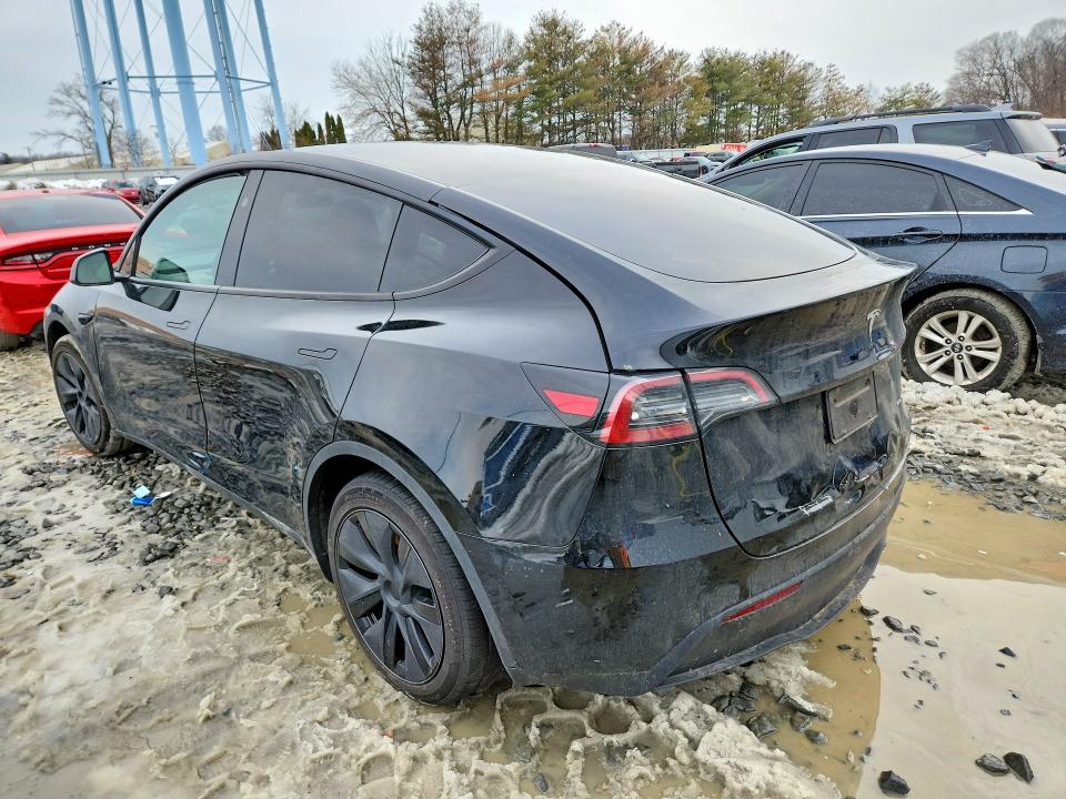 2025 Tesla Model y VIN 7SAYGDEE5SF287417 COPART salvage auction — SIDE, Nj - Cert Of Title-Salvage, sold $8,400 on 2026-07-29 (photo 2)