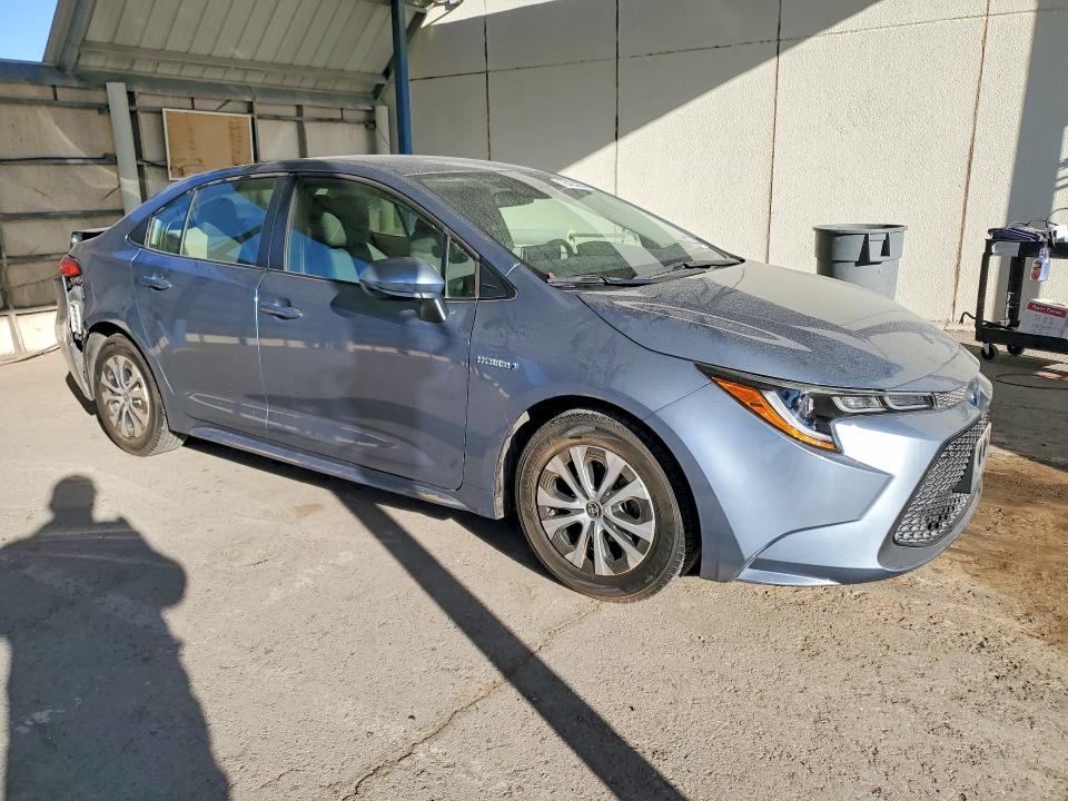 2021 Toyota Corolla VIN JTDEAMDE9MJ035264 COPART salvage auction — REAR END, TX - SALVAGE VEHICLE TITLE, sold $7,800 on 2026-07-31 (photo 4)