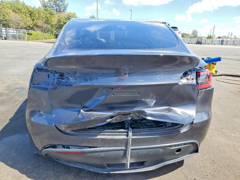 2022 Tesla Model y VIN 7SAYGDEF7NF309916 COPART salvage auction — ALL OVER, Mo - Salvage Certificate Of Title, sold $2,100 on 2026-07-22 (photo 6)