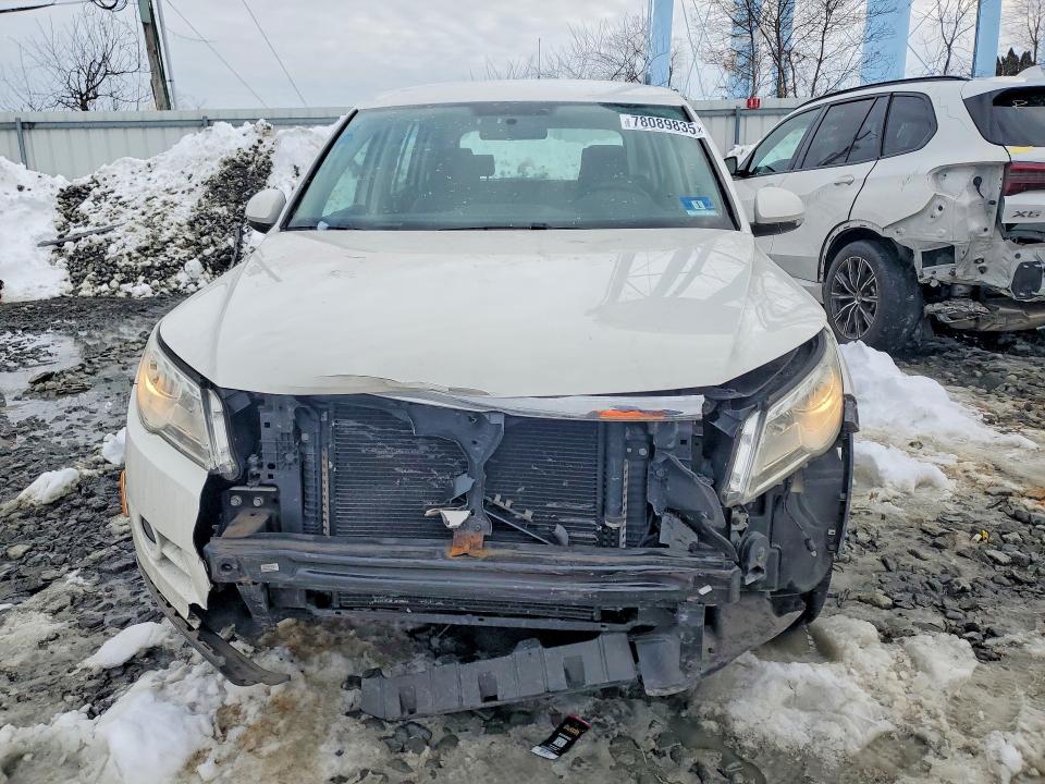 2009 Volkswagen Tiguan VIN WVGCV75N79W517653 COPART salvage auction — FRONT END, Id - Salvage Certificate Of Title, sold $425 on 2026-07-06 (photo 5)