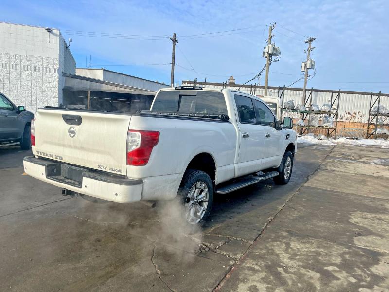 2020 Nissan TITAN VIN 1N6AA1FB9LN511291 COPART salvage auction — MINOR DENT/SCRATCHES, Mi - Dealer Only-Rebuilt Salvage (P), sold $15,400 on 2026-07-28 (photo 4)